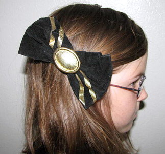 80s black and gold hair bow (photo credit: Crystal’s Closet)