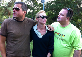 Alli of Like Totally 80s striking a U2 pose with Sean and Steve of Stuck in the 80s