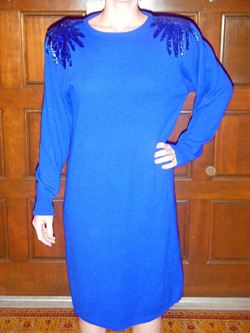 Blue sweater dress with sequence bursts on the shoulders (photo credit: VinTaGeOus)