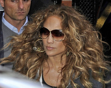 JLo rocks big hair & big glasses while in London