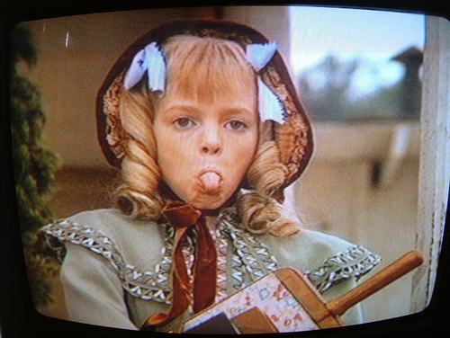 Nellie Oleson played by Alison Arngrim