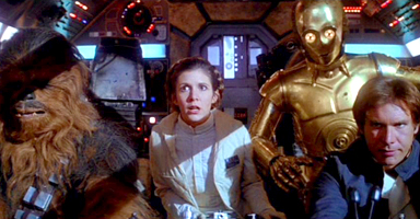 Chewy, C3P0, Leia & Hans in the cockpit of the Millenium Falcon