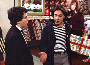 Mike Damone (Robert Romanus) giving Mark 'Rat' Ratner (Brian Backer) dating advise.