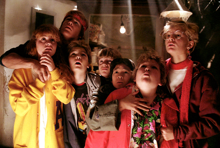 The Goonies get scared in the cave while searching for the lost treasure