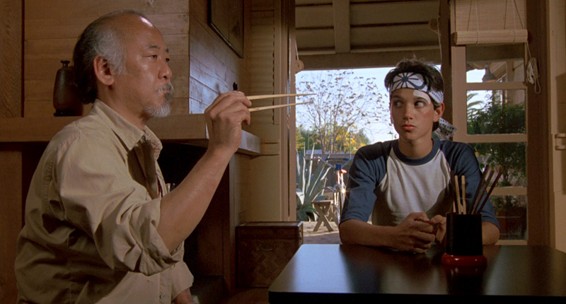 Mr. Miyagi catches a fly with chopsticks