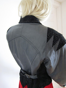 80s leather ladies jacket with origami-inspired shoulders
