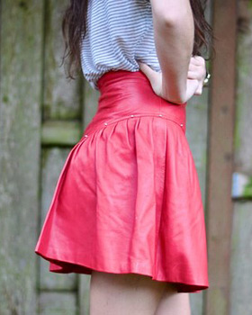 Cute red leather mini skirt with gold studs!