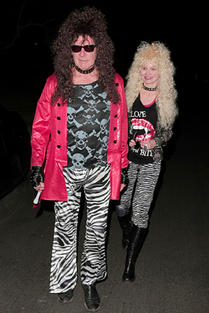 Harrison Ford and Calista Flockhart rocked 80s hair band looks for Halloween (2011).