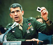 1986 - Iran-Contra Affair: Oliver North shredds documents implicating himself in selling weapons to Iran and channeling the proceeds to fund Contra rebels in Nicaragua