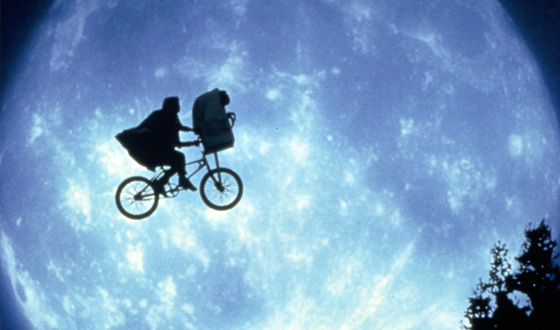 E.T. and Elliott fly across the moon