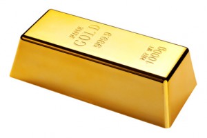 Photo of a 1kg gold bar isolated on a white background with clipping path